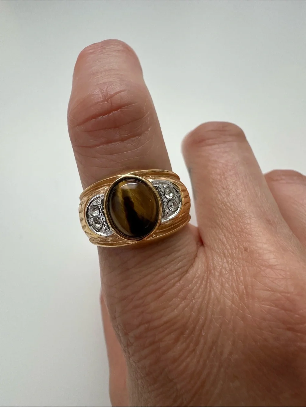 Gold Tone Ring with Brown Tiger's Eye Center and Clear Accent Stones